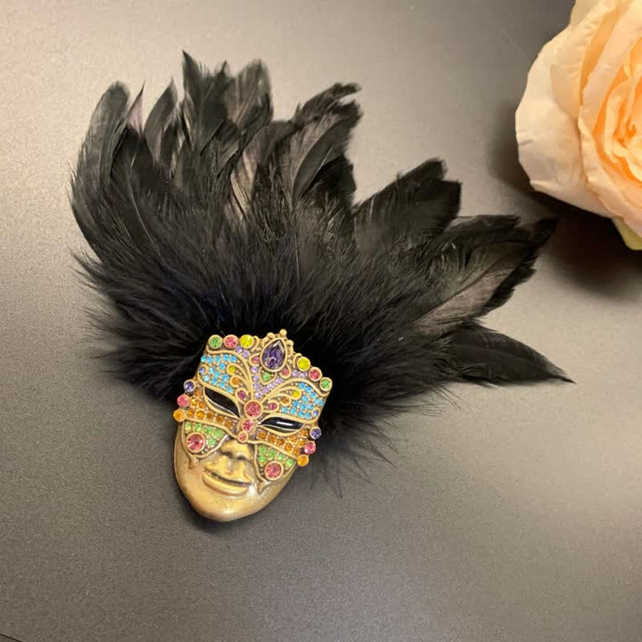 Spilla con piuma maschera tribù primitive