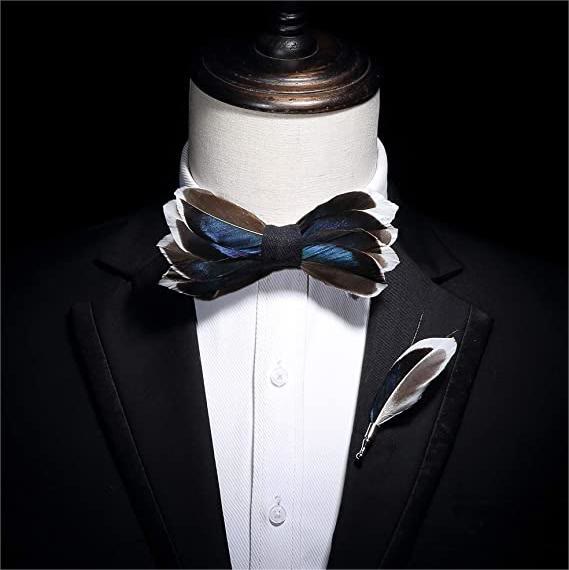 Papillon con piume grazioso blu scuro e marrone per bambini con spilla da bavero
