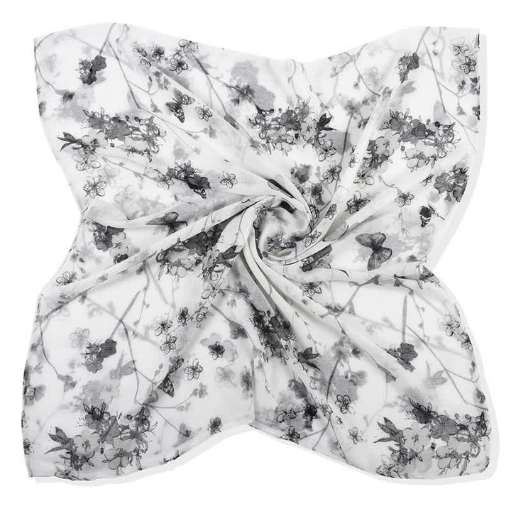 Sciarpa lunga avvolgente con motivo floreale vivace ed elegante da donna