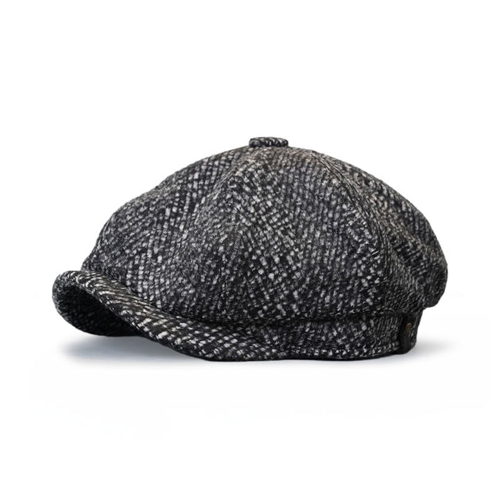 Berretto ottagonale da strillone in tweed maculato nero