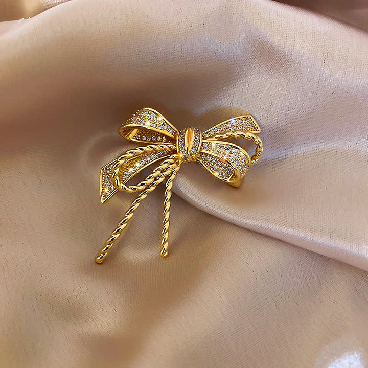 Spilla da donna con fiocco e zirconi - Oro - image 0