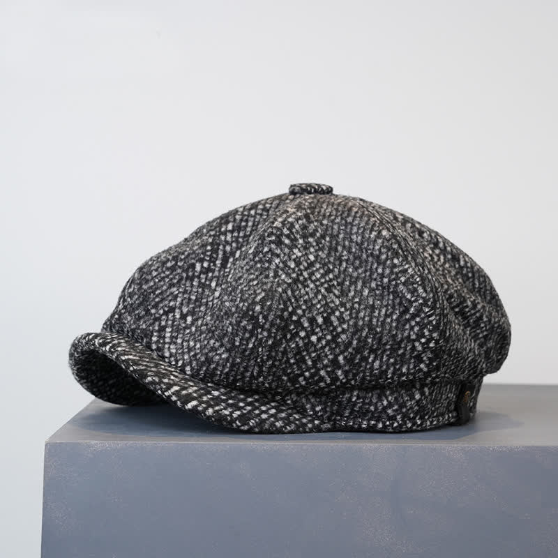 Berretto ottagonale da strillone in tweed maculato nero