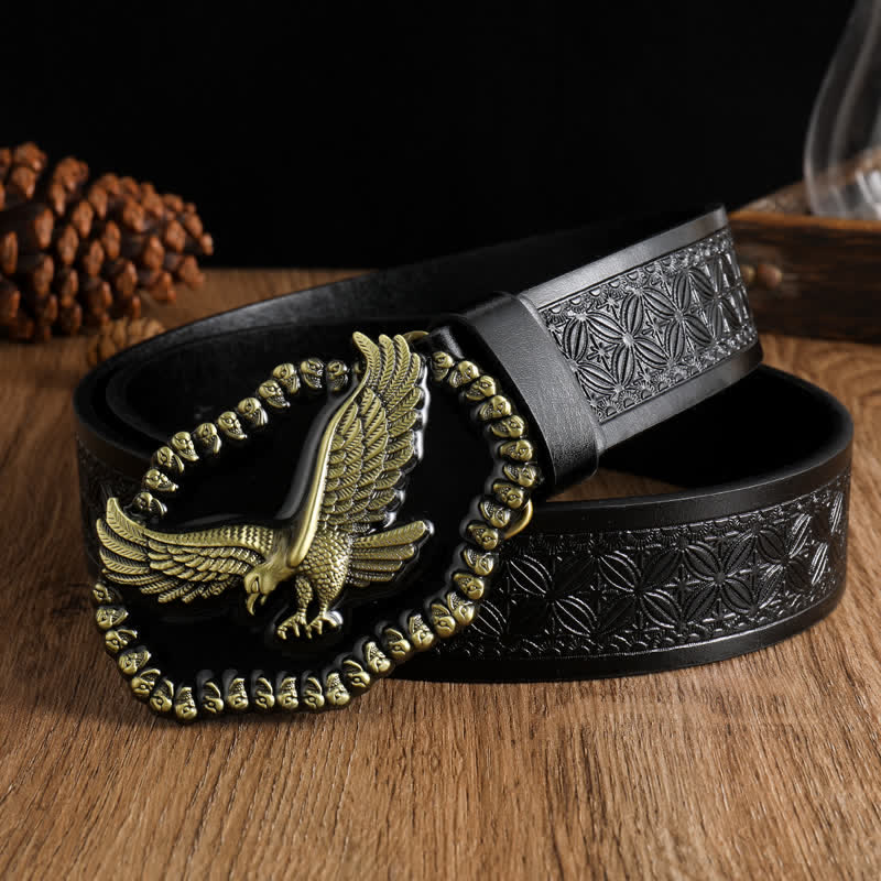 Cintura in pelle da uomo con aquila in oro antico e falco che vola