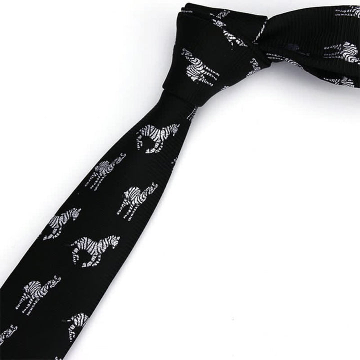 Cravatta da uomo nera sottile in twill con motivi zebrati