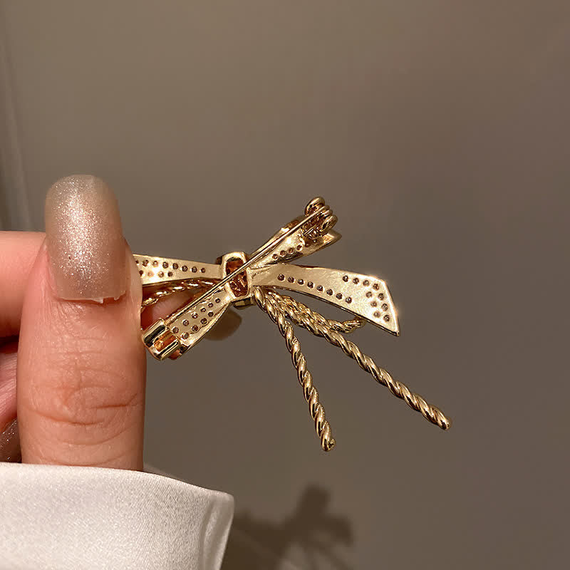Spilla da donna con fiocco e zirconi