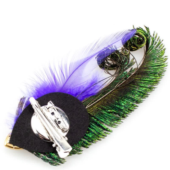 Spilla con piume di pavone e strass