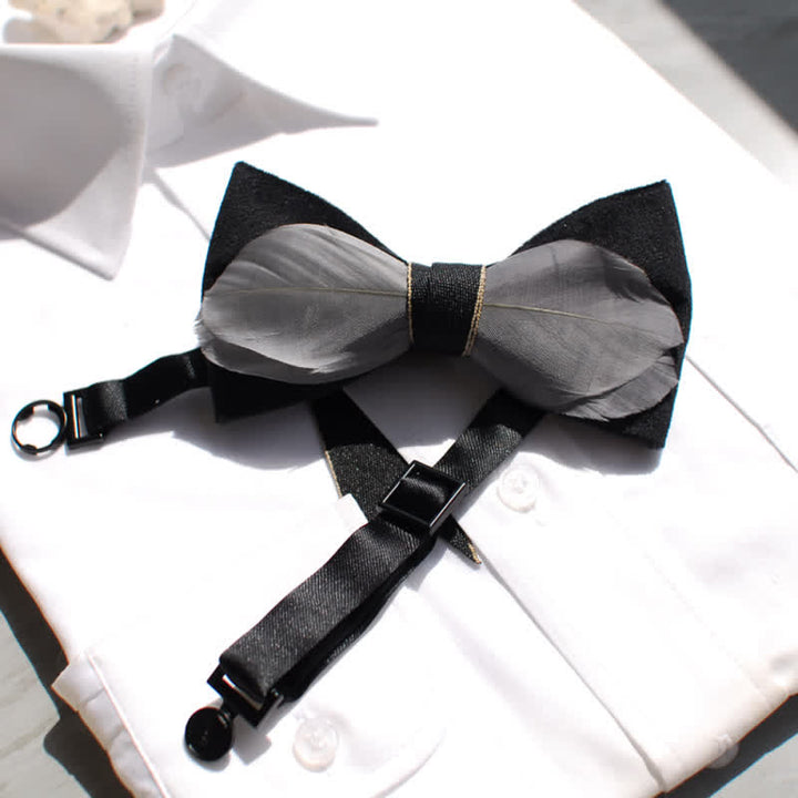 Papillon in velluto grigio e nero con piume