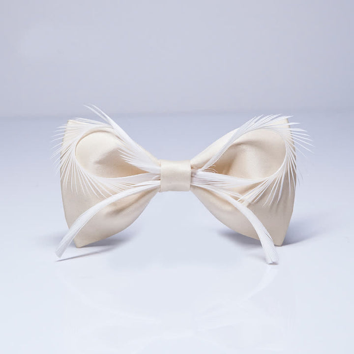 Papillon da uomo con fiocco in piuma color champagne