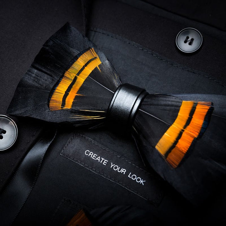 Papillon con piume di mezzanotte, nero e arancione, per bambini, con spilla da bavero