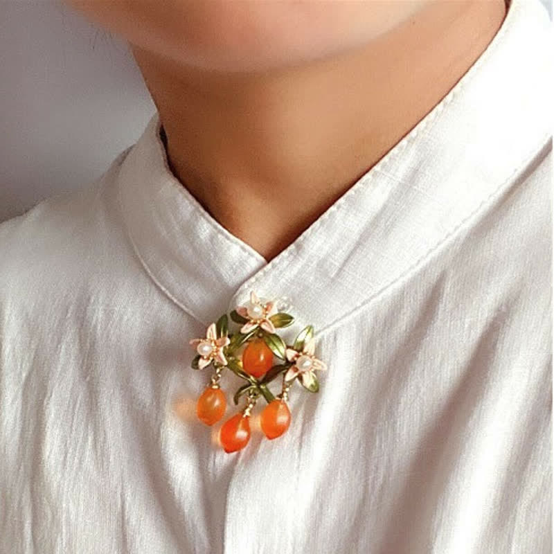 Spilla pastorale da donna con frutti di bosco arancioni