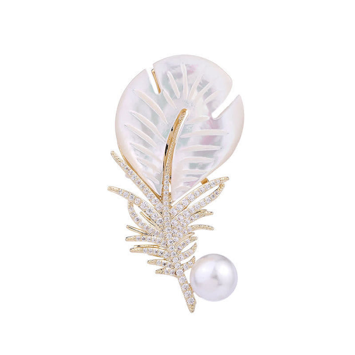 Spilla con piuma e conchiglia di perle da donna
