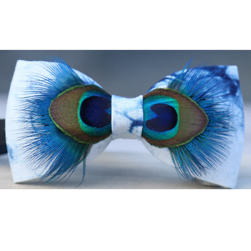 Papillon con piume di pavone colore blu e bianco