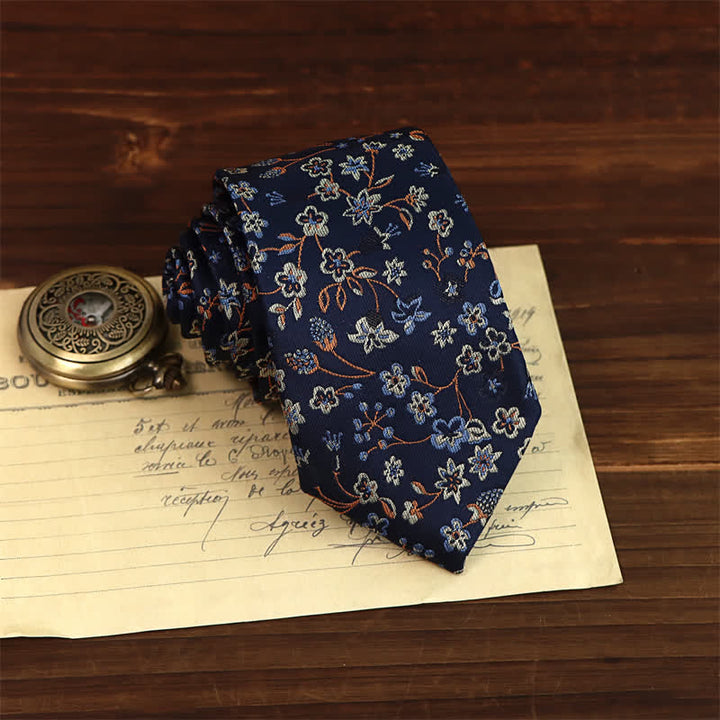 Cravatta da uomo con motivo floreale blu navy e bianco misterioso