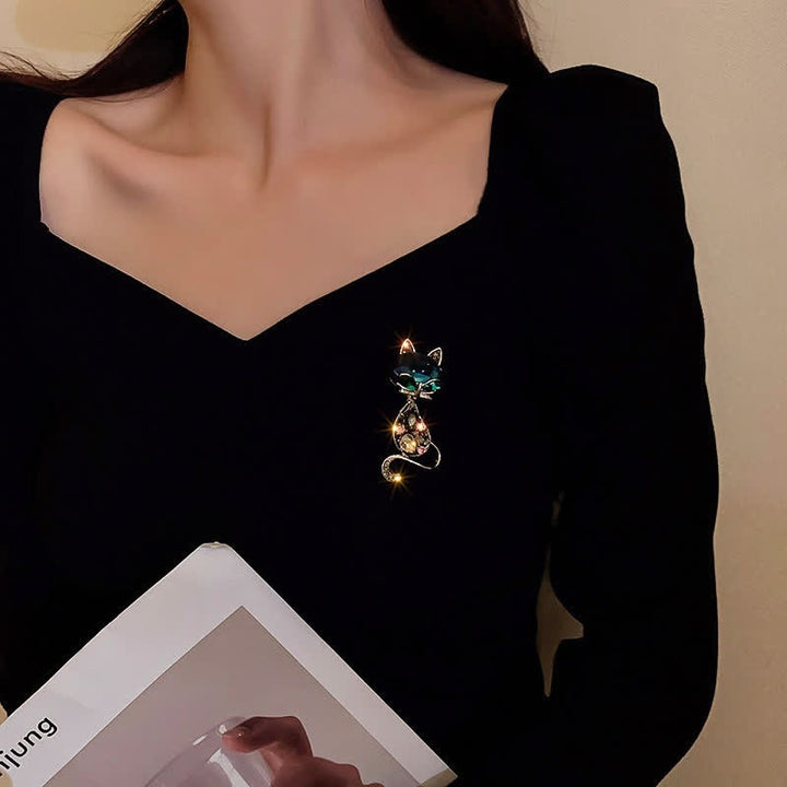 Spilla da donna con occhi di volpe color verde acqua