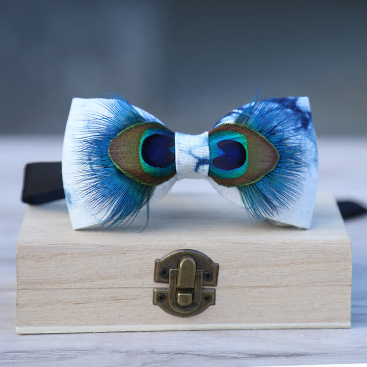 Papillon con piume di pavone colore blu e bianco